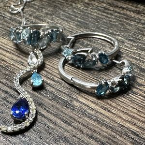 Silver and topaz necklace, ring and earrings